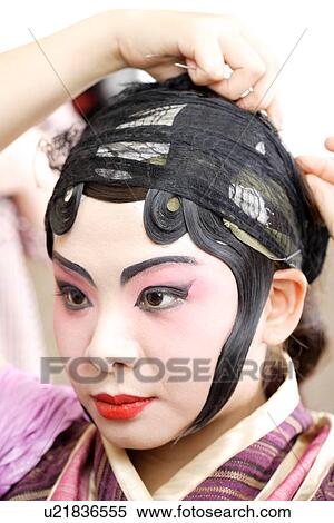 Stock Photography - Chinese traditional opera character dressing. Fotosearch