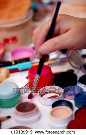 Hand with Make-up and Brush View Large Photo Image Stock Photo - Hand with Make-up and Brush. Fotosearch