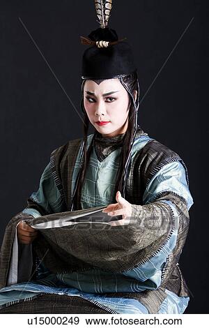 Mature man wearing traditional clothing and headdress View Large Photo Image Stock Photo - Mature man wearing traditional clothing and headdress. Fotosearch