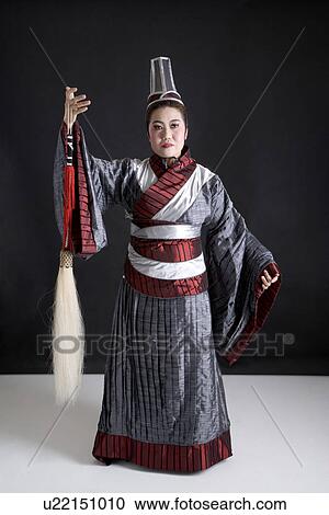 Mature woman wearing traditional man clothing View Large Photo Image Stock Image - Mature woman wearing traditional man clothing. Fotosearch