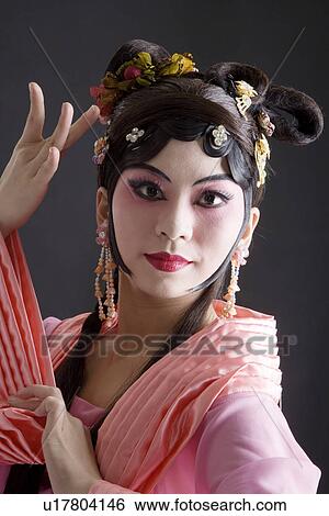 Stock Photograph - Mature woman wearing traditional clothing. Fotosearch