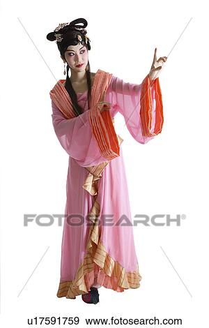 Stock Photo - Portrait of Beijing opera performer in traditional dress and make up. Fotosearch