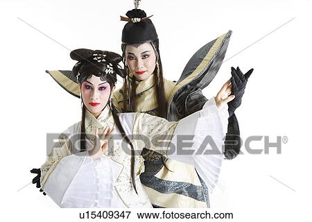 Stock Photo - Woman and man wearing traditional clothing. Fotosearch