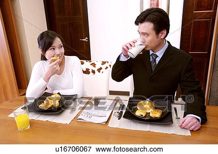 Stock Photo - Couple having breakfast. Fotosearch
