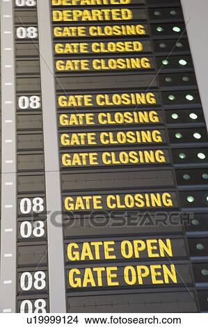 Picture - Close-up of an arrival departure board at an airport. Fotosearch