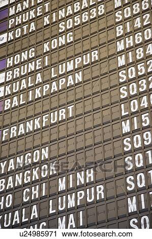 Stock Image - Close-up of an arrival departure board at an airport. Fotosearch