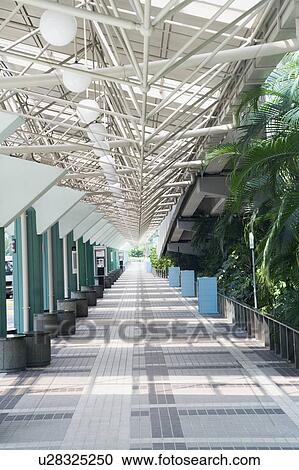 Empty walkway at an airport View Large Photo Image Stock Image - Empty walkway at an airport. Fotosearch