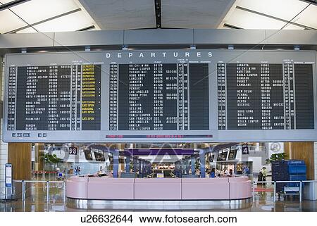 Picture - Arrival departure board at an airport. Fotosearch
