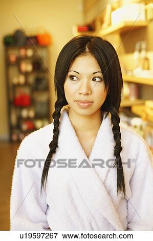 Stock Photo - Close-up of a young woman. Fotosearch