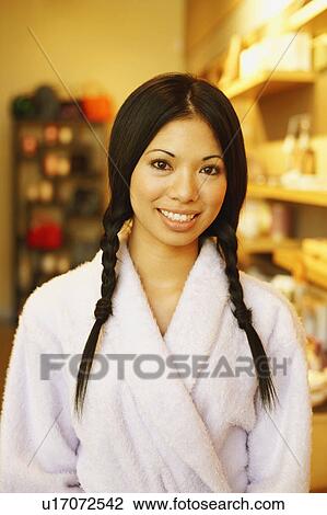 Portrait of a young woman smiling View Large Photo Image Stock Image - Portrait of a young woman smiling. Fotosearch