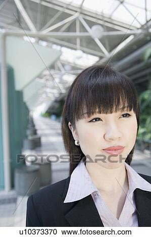 Stock Image - Close-up of a businesswoman. Fotosearch