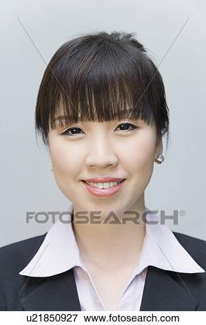 Portrait of a businesswoman smiling View Large Photo Image Stock Photo - Portrait of a businesswoman smiling. Fotosearch