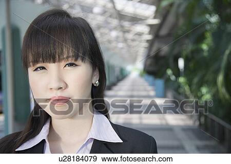 Stock Photo - Portrait of a businesswoman. Fotosearch