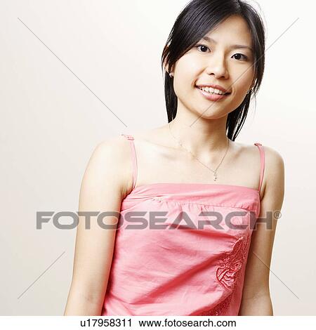 Portrait of a young woman posing View Large Photo Image Stock Image - Portrait of a young woman posing. Fotosearch