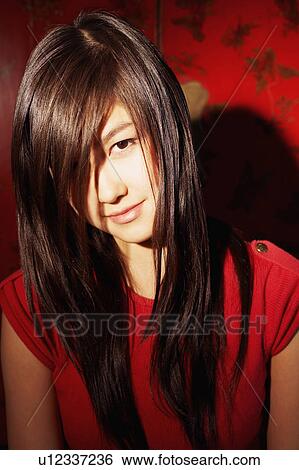 Portrait of a young woman View Large Photo Image Stock Photograph - Portrait of a young woman. Fotosearch