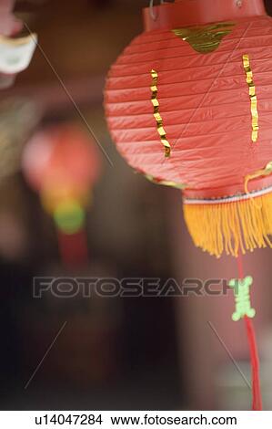 Picture - Close-up of a Chinese lantern in a temple. Fotosearch