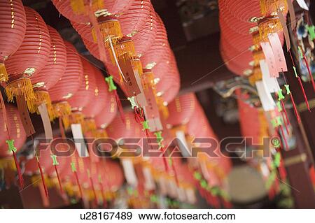 Low angle view of Chinese lanterns in a temple View Large Photo Image Stock Photo - Low angle view of Chinese lanterns in a temple. Fotosearch