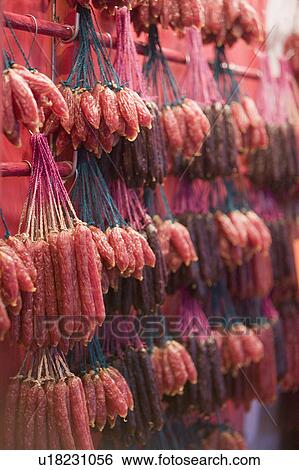 Sausages hanging from strings View Large Photo Image Stock Photograph - Sausages hanging from strings. Fotosearch