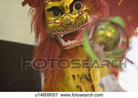 Stock Photo - Close-up of a Chinese lion dance. Fotosearch