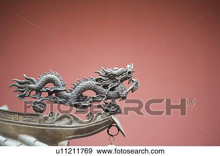 Stock Photo - Close-up of a dragon sculpture in a temple. Fotosearch