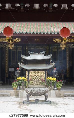 Decorative urn in a courtyard of a temple View Large Photo Image Stock Photo - Decorative urn in a courtyard of a temple. Fotosearch