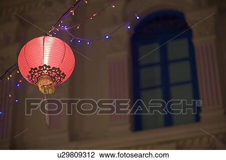 Low angle view of a Chinese lantern lit up at night, Chinatown, Singapore View Large Photo Image Stock Image - Low angle view of a Chinese lantern lit up at night, Chinatown, Singapore. Fotosearch