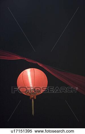 Low angle view of a Chinese lantern lit up at night View Large Photo Image Stock Photography - Low angle view of a Chinese lantern lit up at night. Fotosearch