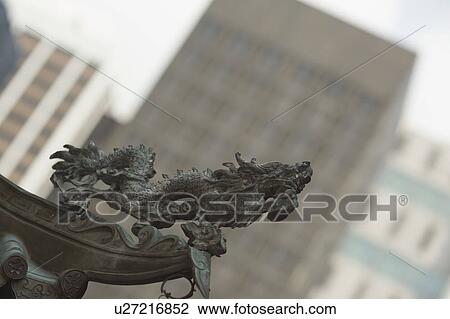 Low angle view of a dragon sculpture in a temple View Large Photo Image Stock Image - Low angle view of a dragon sculpture in a temple. Fotosearch