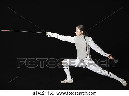 Male fencer fencing View Large Photo Image Stock Photography - Male fencer fencing. Fotosearch