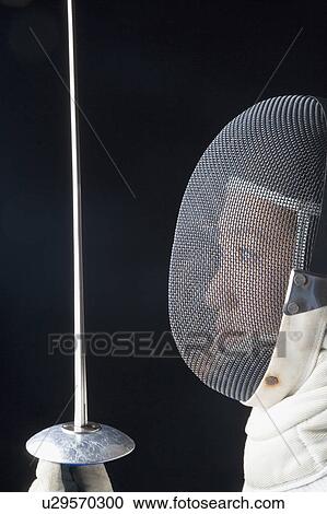 Side profile of a female fencer holding a fencing foil View Large Photo Image Stock Image - Side profile of a female fencer holding a fencing foil. Fotosearch