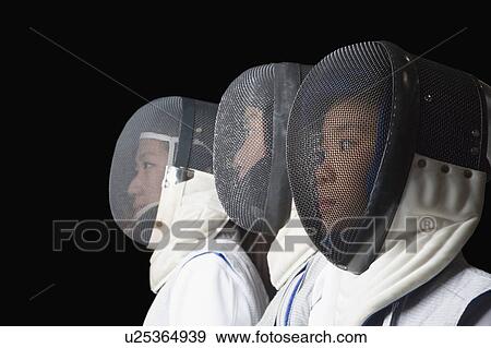 Stock Photo - Side profile of three female fencers side by side. Fotosearch