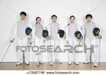 Stock Photograph - Five fencers standing side by side. Fotosearch