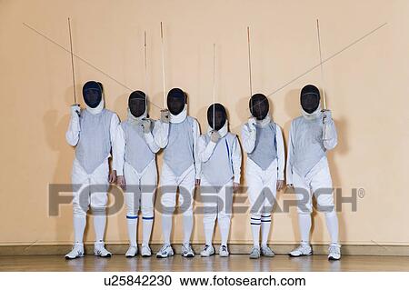 Group of people in fencing costume standing side by side View Large Photo Image Stock Image - Group of people in fencing costume standing side by side. Fotosearch