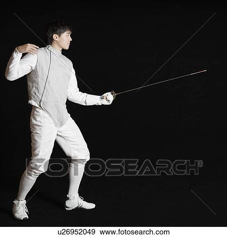 Stock Photo - Male fencer holding a fencing foil. Fotosearch
