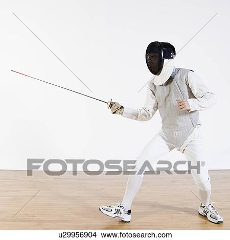 Picture - Man practicing fencing. Fotosearch