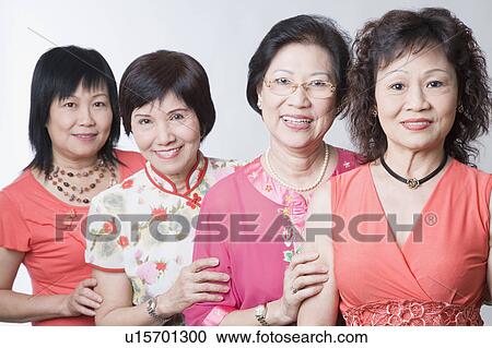Portrait of three senior women and a mature woman smiling View Large Photo Image Stock Image - Portrait of three senior women and a mature woman smiling. Fotosearch