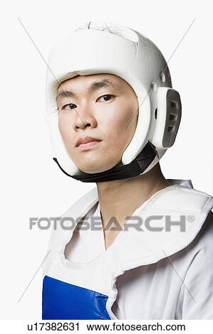 Portrait of a young man wearing a sports helmet View Large Photo Image Stock Image - Portrait of a young man wearing a sports helmet. Fotosearch