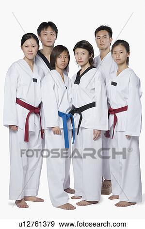 Portrait of a group of martial arts player standing View Large Photo Image Stock Photo - Portrait of a group of martial arts player standing. Fotosearch
