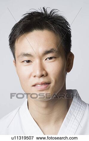 Portrait of a young man View Large Photo Image Stock Photo - Portrait of a young man. Fotosearch