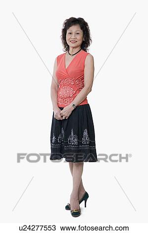Stock Image - Portrait of a senior woman smiling. Fotosearch