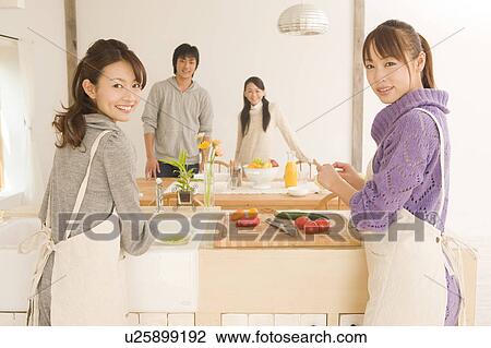 Young people preparing home party View Large Photo Image Stock Image - Young people preparing home party. Fotosearch