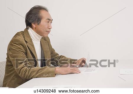 Businessman sitting View Large Photo Image Stock Photo - Businessman sitting. Fotosearch