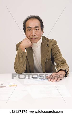 Portrait of Mature Man in office View Large Photo Image Stock Photography - Portrait of Mature Man in office. Fotosearch