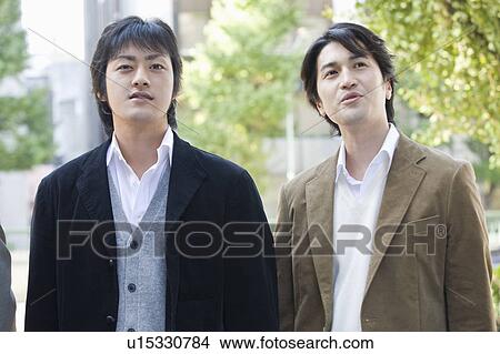 Portrait of two businessman in winter clothes View Large Photo Image Picture - Portrait of two businessman in winter clothes. Fotosearch