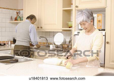 Senior couple cooking View Large Photo Image Stock Image - Senior couple cooking. Fotosearch