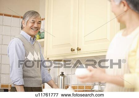 Senior couple cooking View Large Photo Image Stock Photo - Senior couple cooking. Fotosearch