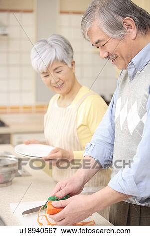 Senior couple cooking View Large Photo Image Stock Photo - Senior couple cooking. Fotosearch