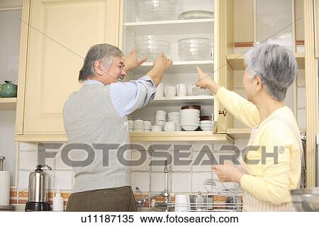 Senior couple cooking View Large Photo Image Stock Photography - Senior couple cooking. Fotosearch