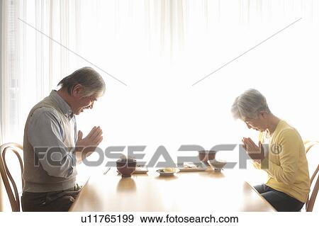 Senior couple having meal View Large Photo Image Stock Photo - Senior couple having meal. Fotosearch
