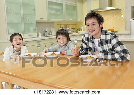 Father and children eating curry and rice View Large Photo Image Stock Image - Father and children eating curry and rice. Fotosearch